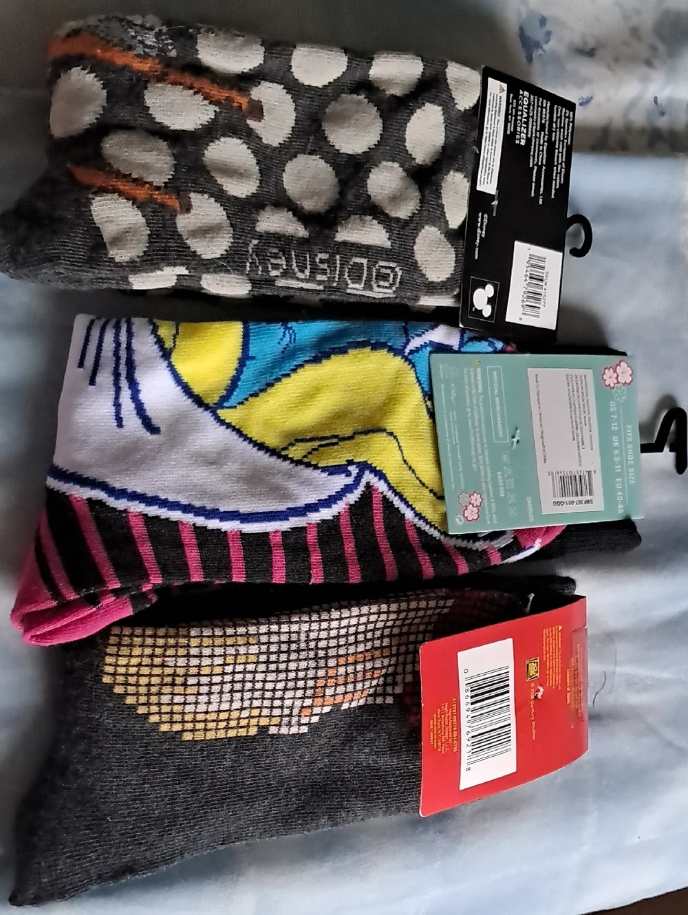 Disney, smurf and home alone socks